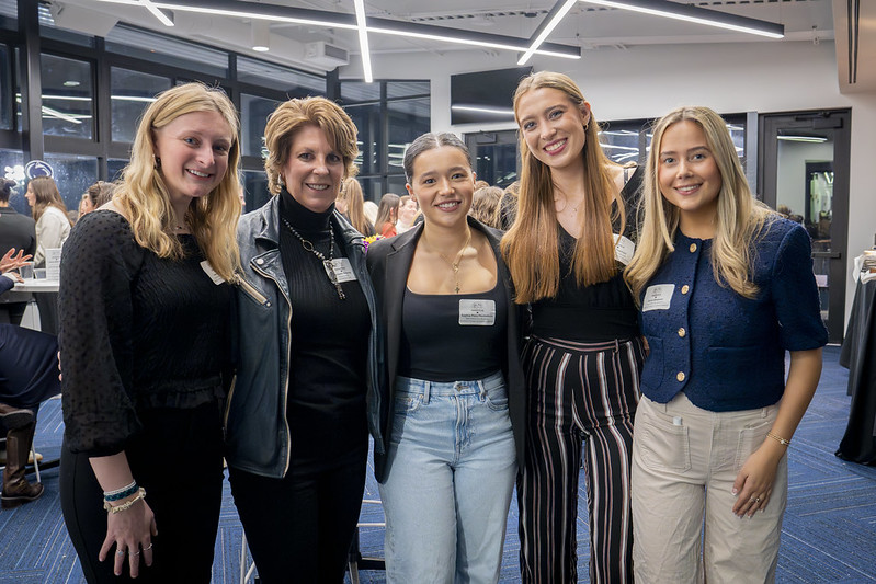 Alumnae and student-athletes together at a TFL event
