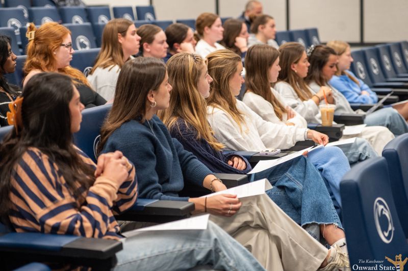 Students seated at a PowHER Hour session