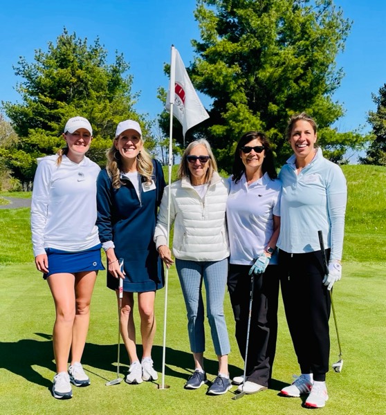 Alumnae on the green at the annual TFL Golf Outing